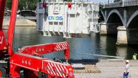 Arrivée du transformateur Enedis, un cube de 130 tonnes, au port de Tolbiac à Paris le 22 juin 2026.