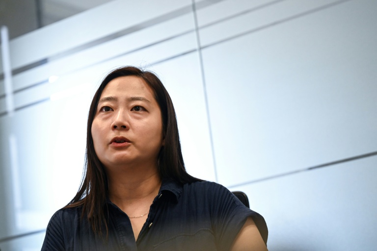 La Sud-Coréenne Baek Song-yi, qui fait campagne pour le droit des victimes de harcèlement au travail, le 17 juillet 2026 à Séoul
