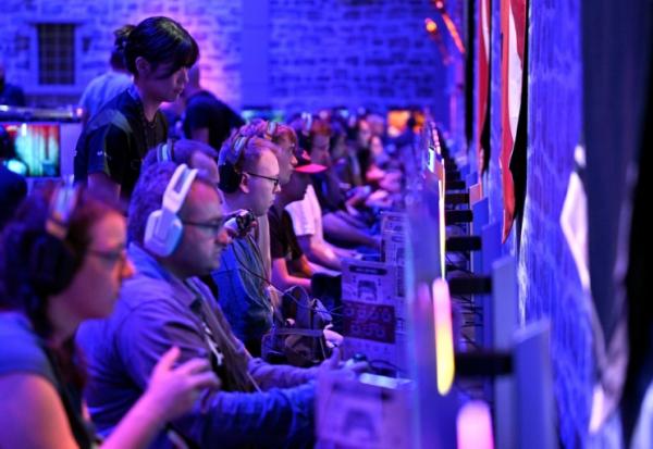 Des joueurs lors de la Gamescon, un salon international consacré au jeu vidéo, le 21 août 2025 à Cologne 