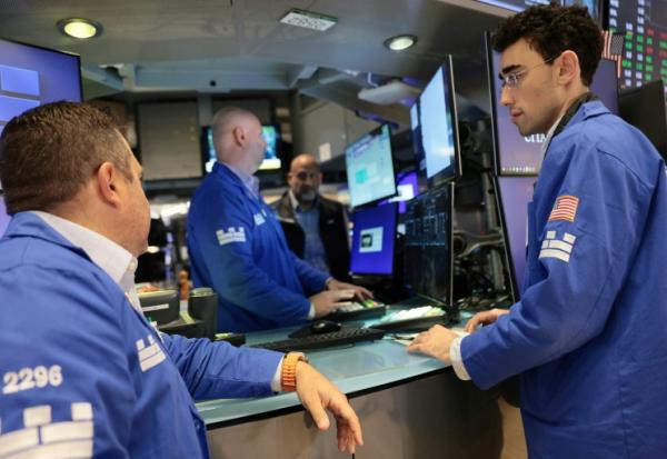 Traders sur le parquet du New York Stock Exchange, le 14 septembre 2026.