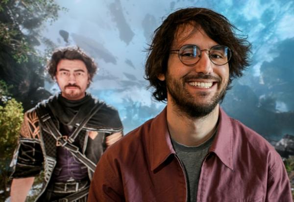 Le fondateur de Sandfall Interactive, Guillaume Broche, pose devant une image du jeu "Clair Obscur, Expedition 33" à Montpellier, le 10 avril 2025