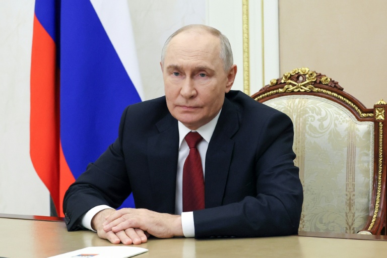 Photo diffusée par l'agence officielle Sputnik le 16 septembre 2026 montrant le président russe Vladimir Poutine lors d'une allocution télévisée