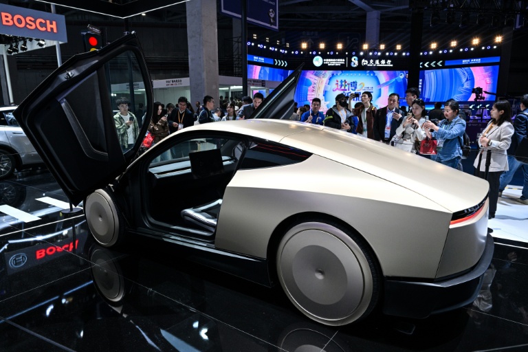 A prototype of Tesla's Cybercab seen at the 8th International Import Expo in Shanghai in November 2025
