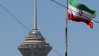 Le drapeau iranien près de la tour Milad à Téhéran, le 25 mai 2026