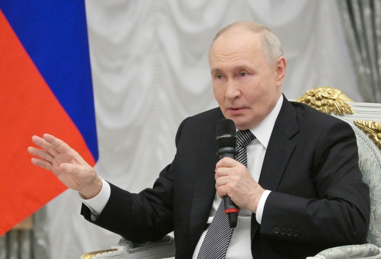 Photo diffusée par l'agence de presse russe Sputnik, montrant le président russe Vladimir Poutine au Kremlin, le 22 mai 2026 à Moscou