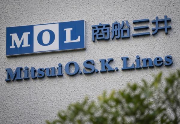 Le logo de la compagnie maritime japonaise Mitsui OSK, au siège de l'entreprise à Tokyo, le 12 mars 2026