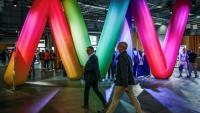 Des visiteurs marchent parmi les stands de la 9e édition du salon VivaTech, à Paris Expo Porte de Versailles, à Paris, le 11 juin 2025