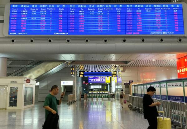 Airports in China cancelled flights and some train services had been affected as China's eastern coast prepared for Typhoon Dolphin