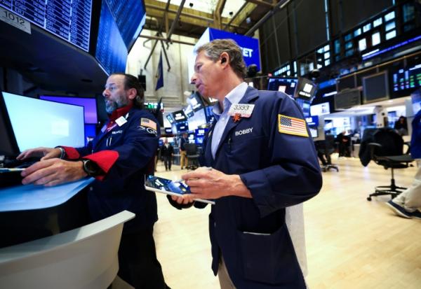 Des opérateurs à la Bourse de New York le 13 octobre 2025