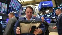 Des opérateurs à la Bourse de New York le 20 avril 2026