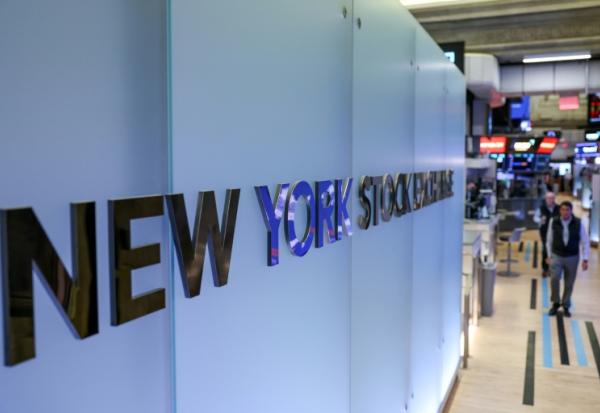 Des opérateurs à la Bourse de New York, le 18 mars 2026