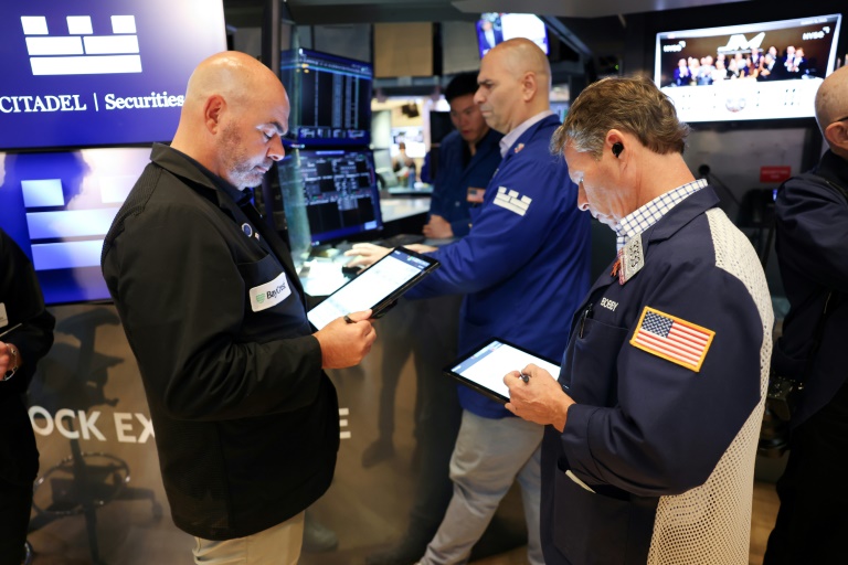 Des opérateurs à la Bourse de New York le 15 août 2025