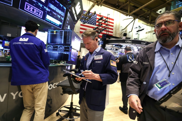 Des opérateurs à la Bourse de New York, le 12 mars 2026