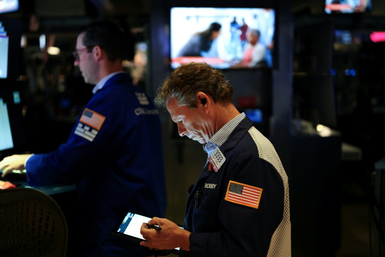 Des opérateurs à la Bourse de New York, le 5 août 2025