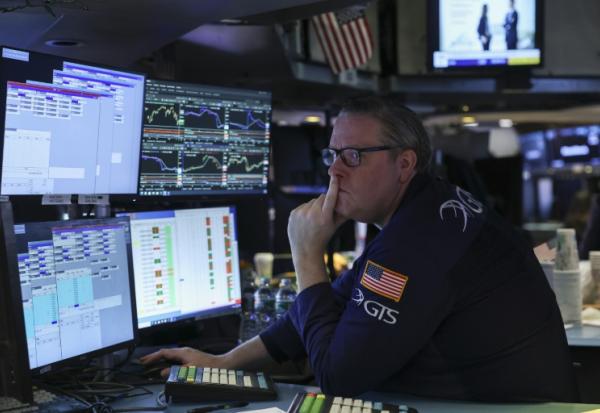 Un opérateur à la Bourse de New York, le 13 février 2026