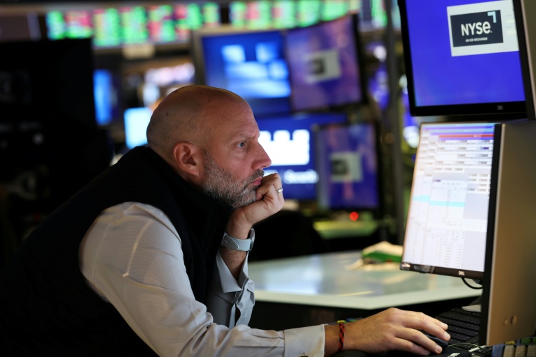 Un opérateur à la Bourse de New York, le 13 octobre 2025