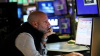 Un opérateur à la Bourse de New York, le 13 octobre 2025