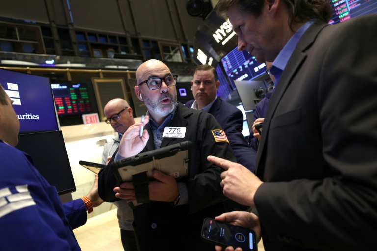 Des opérateurs à la Bourse de New York le 12 mars 2026