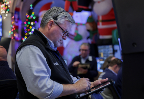 Wall Street repasse dans le rouge en attendant les "stats"